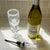 Vintorio Wine Aerator Omni Edition with Vintorio Wine Aerator Pourer and a bottle of white wine